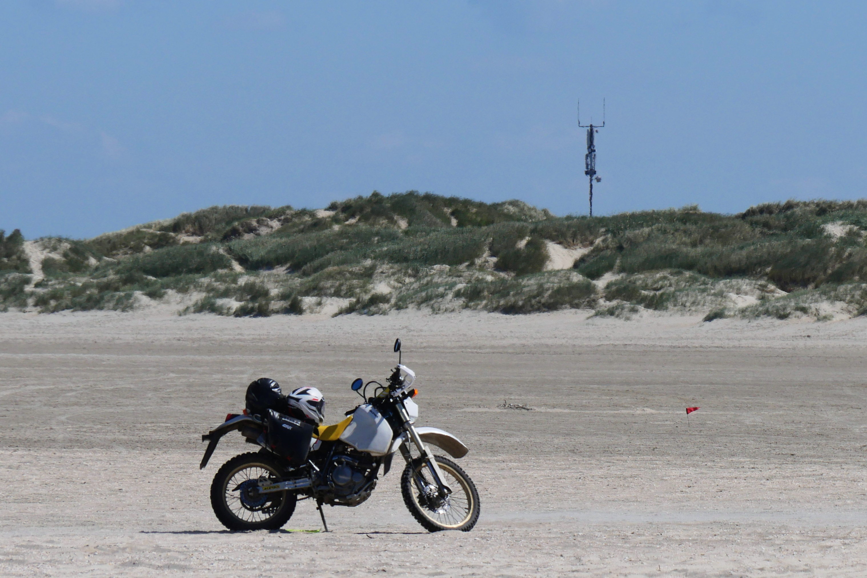 The beach of Romo with a motorcycle